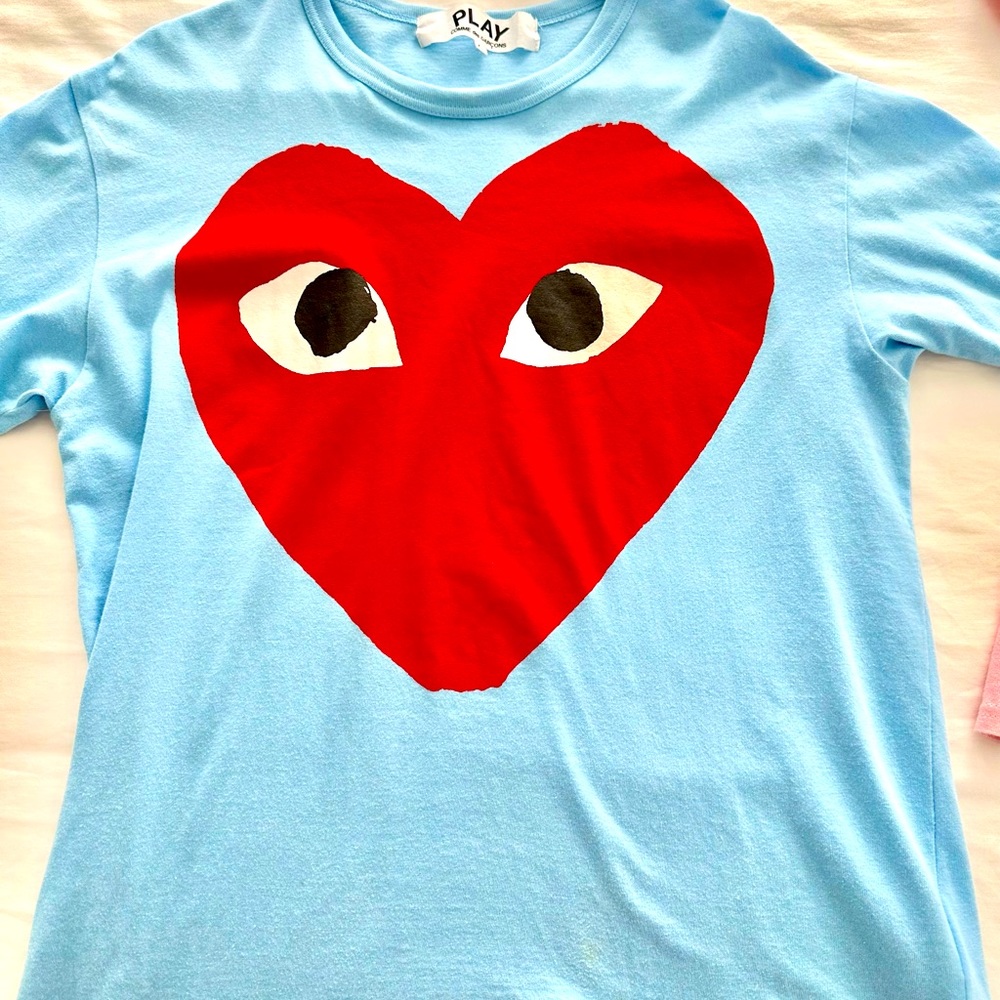 Worn once. Fits more like a large. Perfect condition